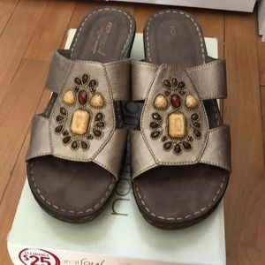 Bronze colored wedge sandals